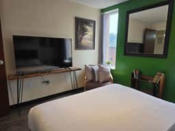 Downtown Apt | Queen Bed + 60” Smart TV - Image 3